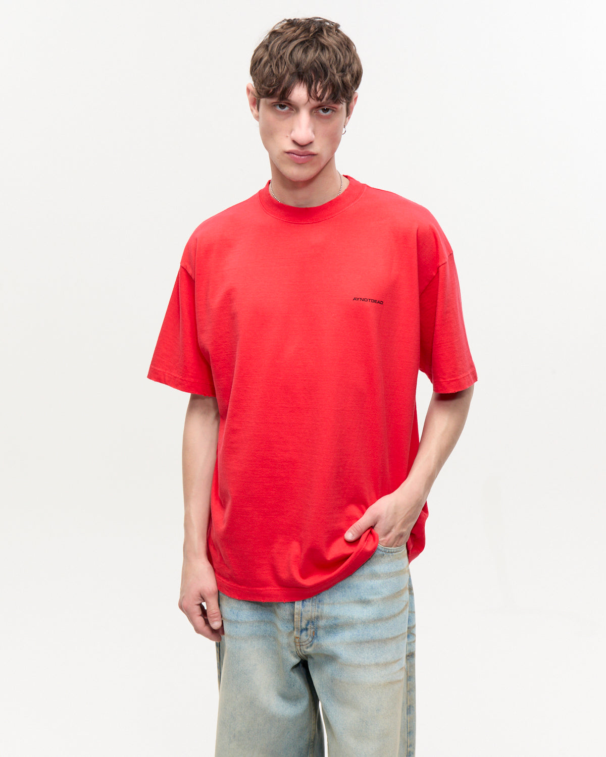 REMERA OVER GASTADA