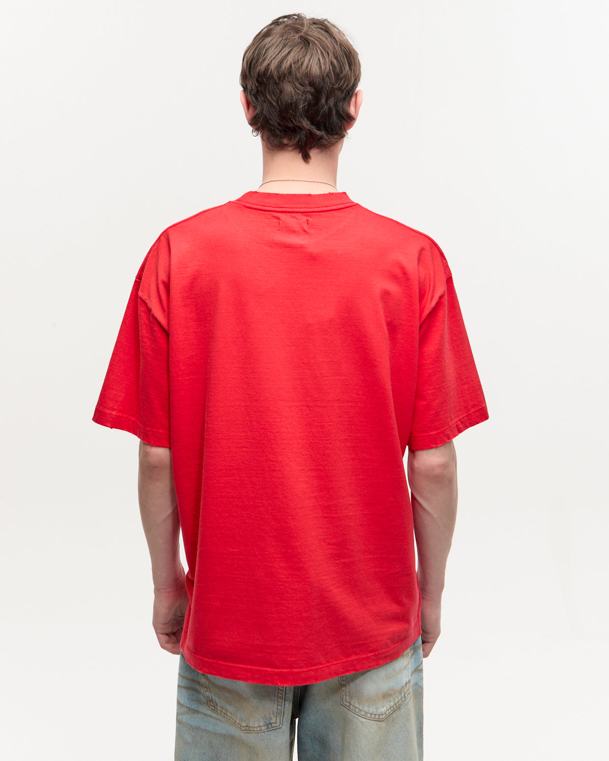 REMERA OVER GASTADA