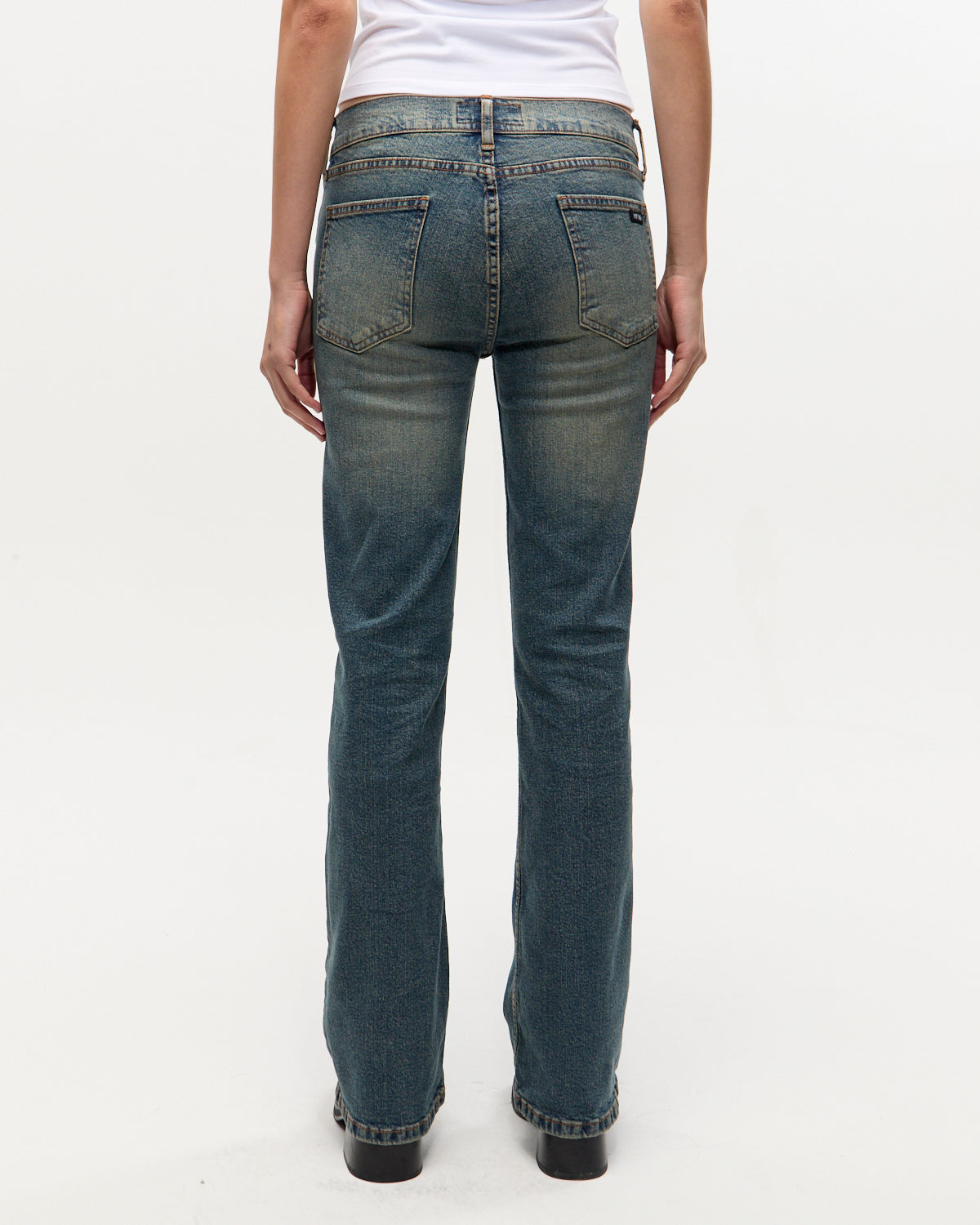 BOOTCUT LOW RISE OILED BLUE