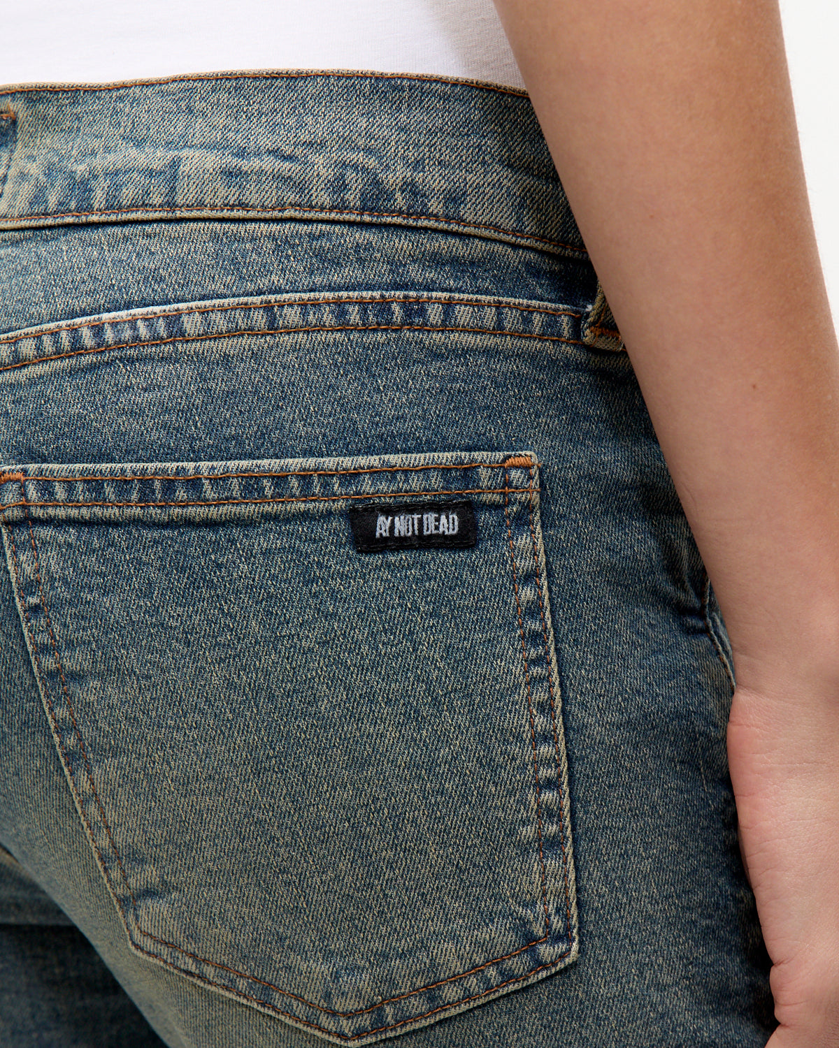 BOOTCUT LOW RISE OILED BLUE